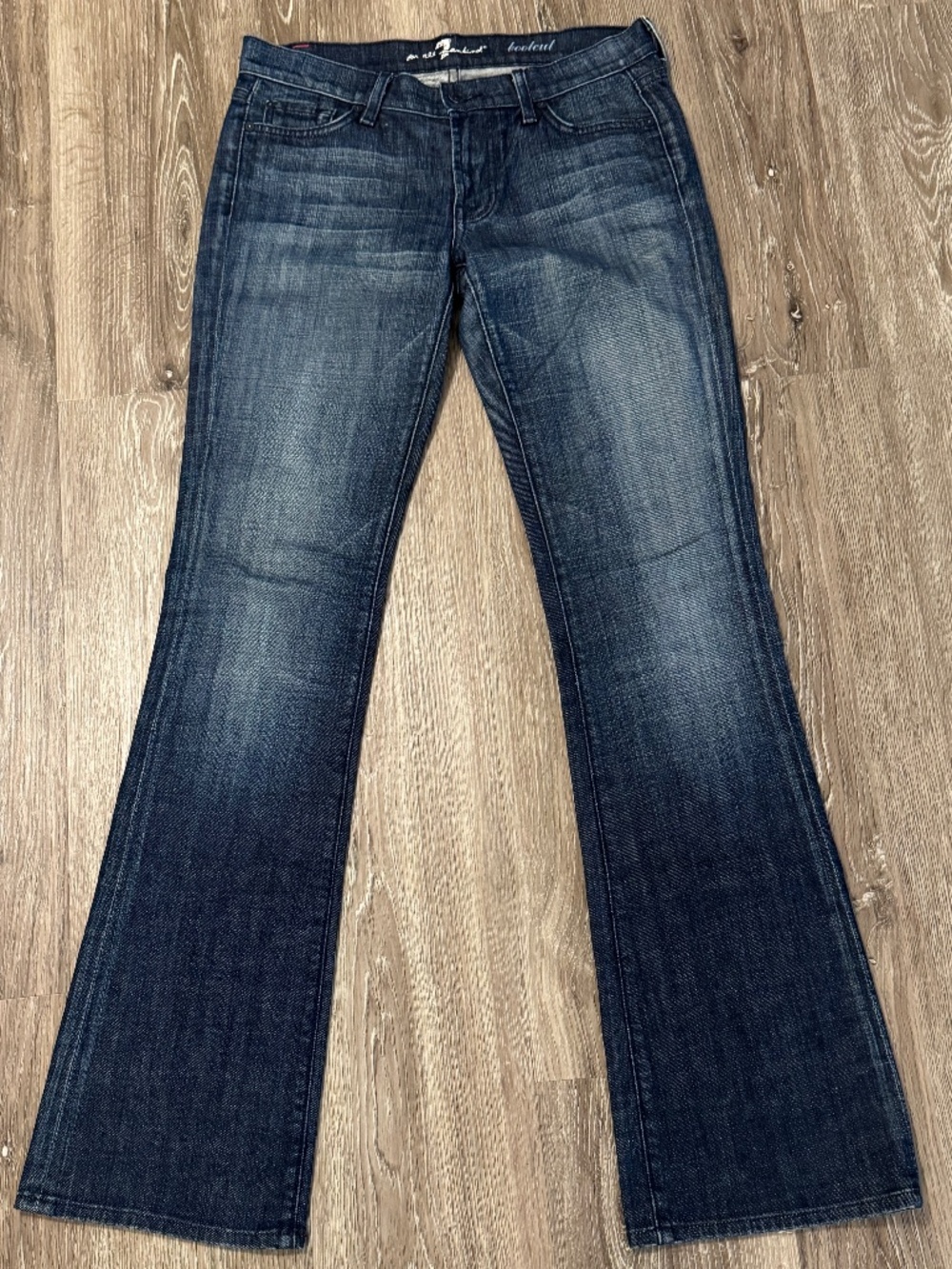 7 For All Mankind Boot Cut Jeans. Sz 28. Button Back Pockets. Very Nice!
